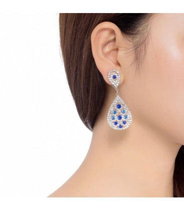 Zilverkleurige oorclips met heldere blauwe strass steentjes