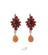 Mooie oranje oorbellen met strass steentjes en kraal
