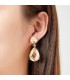 Rode oorclips met glas stenen en een goudkleurige setting