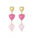 Goudkleurig met roze harten oorhangers