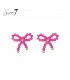 Roze oorhangers in de vorm van een strik