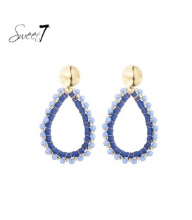 Blauwe raffia oorbellen met een glas stenen rand