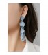 Gele lange oorclips met leuke hangertjes
