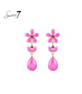 Fuchsia roze oorhangers met glas steentjes