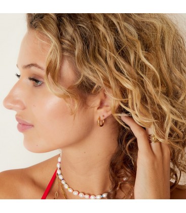 Zilverkleurige oorringen met verschillende delicate patronen