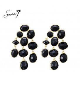 Zwarte oorbellen met gelaagde opbouw en goudkleurige omlijsting