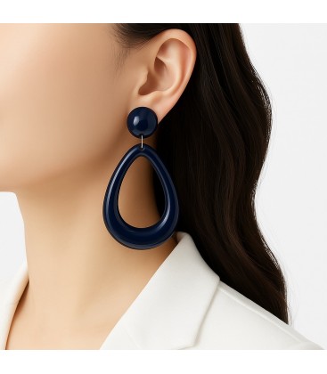 Oorclips in geel met open druppelvormige hanger