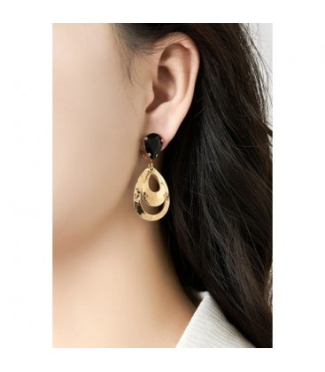 Oorclips met goudkleurige lagen en bruin kristal steentje