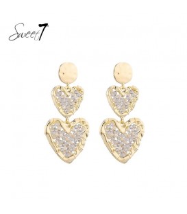 Oorbellen met dubbele harten en beige steentjes