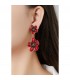 Oorclips met groene bloemen en goudkleurige details