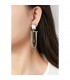 Oorclips met goudkleurige kettingen en strass steentjes
