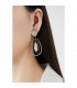 Oorclips rose gold met ivoorkleurige en een open ovale hanger