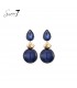 Oorbellen blauw met een glas steentje en een bol als hanger